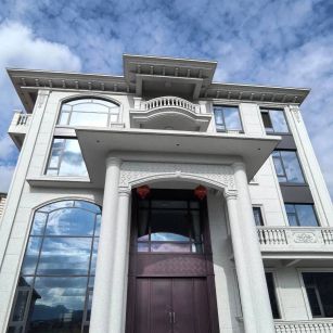 晋城白麻别墅外墙干挂石材效果示例