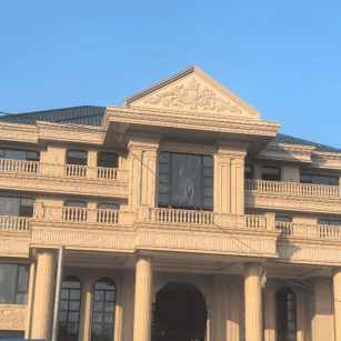 晋城黄金麻别墅外墙干挂石材效果示例