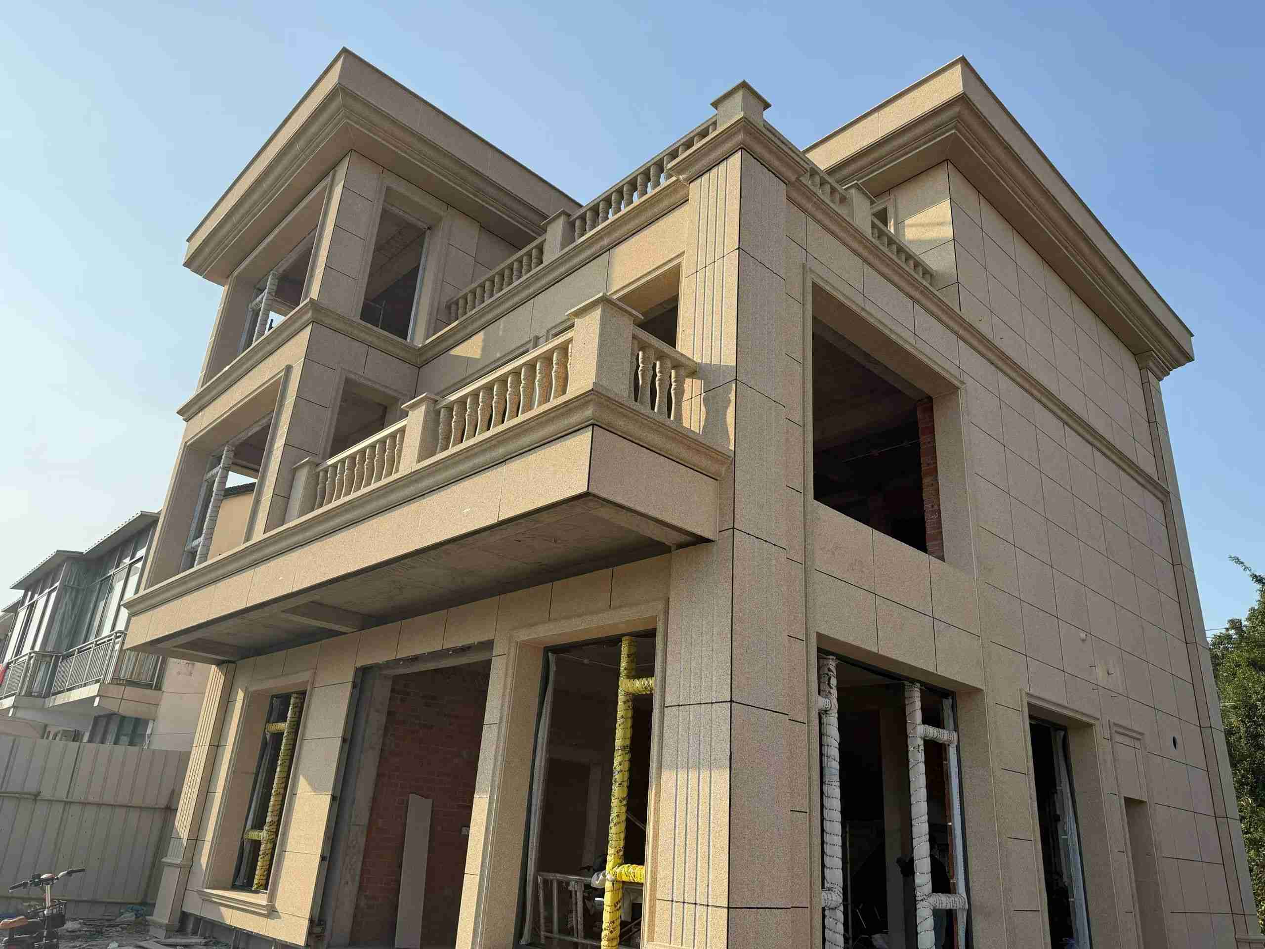 晋城 黄金麻花岗岩石材荔枝面外墙干挂效果展示